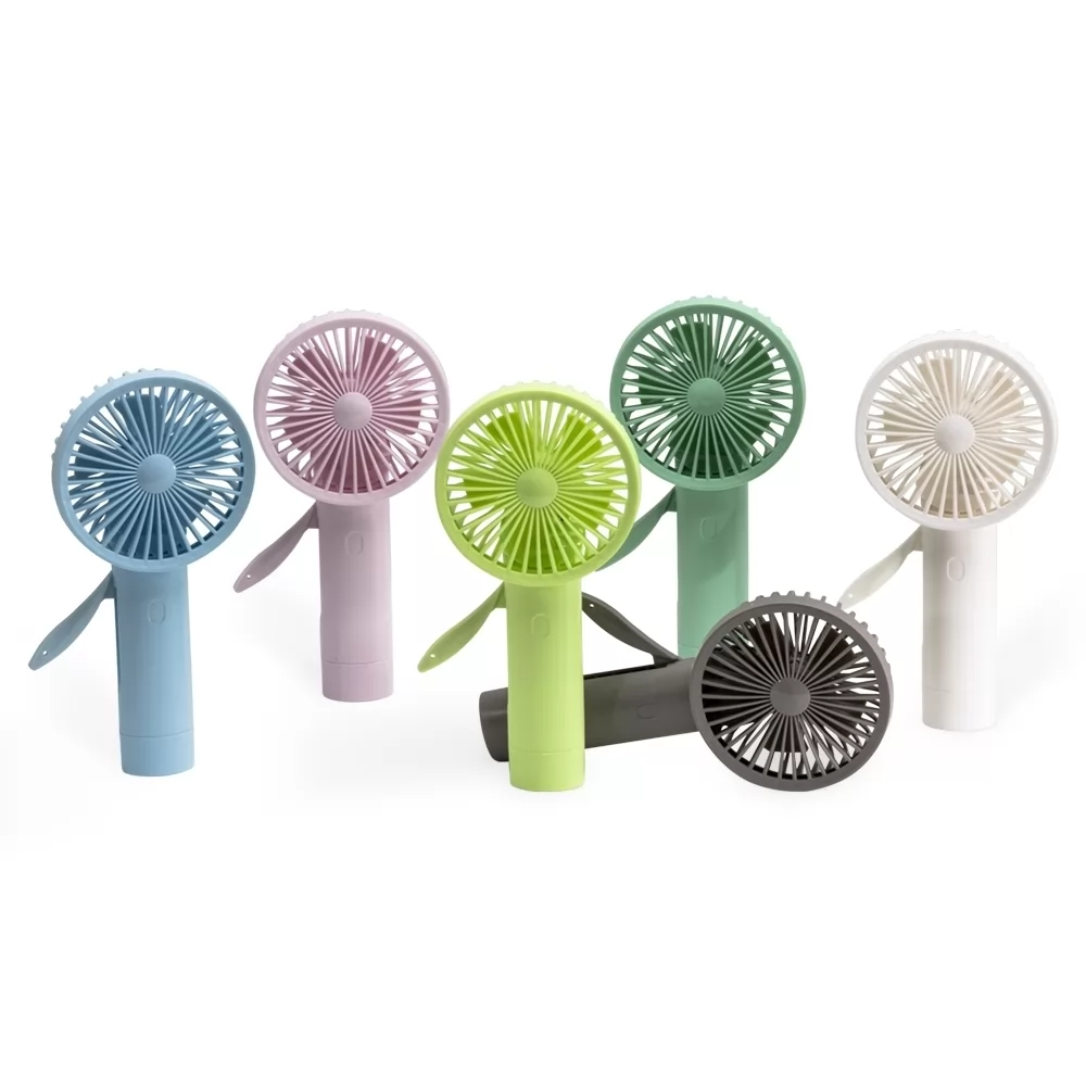 Mini ventilador manual plástico com gatilho lateral exibido em diversas cores sobre fundo branco