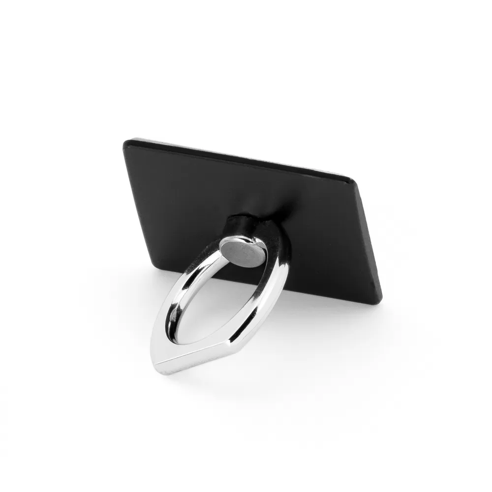 Suporte para celular Georges com base retangular preta e anel metálico prateado apoiado em fundo branco